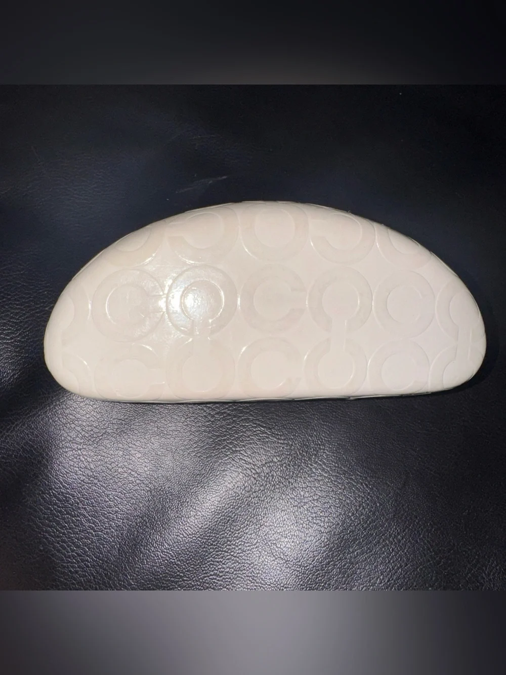 Coach cream embossed